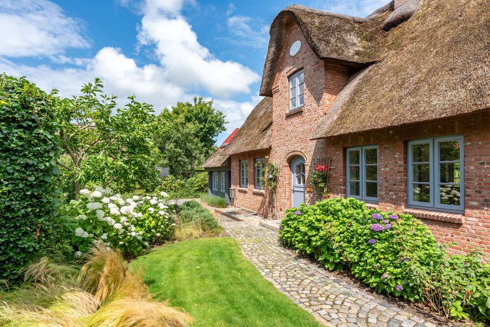 Thumbnail-Haus zum Kaufen in Midlum 1.360.000,00 € 170 m²