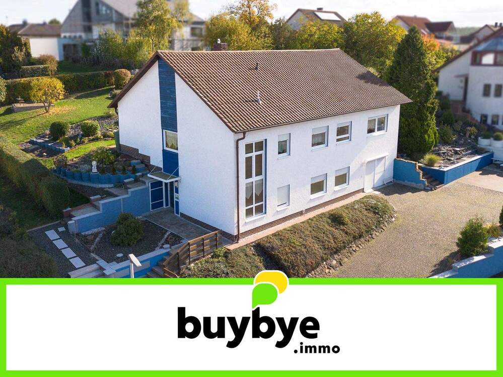 Thumbnail-RESERVIERT: Großbardorf: Zweifamilienhaus mit großem Garten und Ausbaupotenzial - Ihr Zuhause mit Raum für Generationen