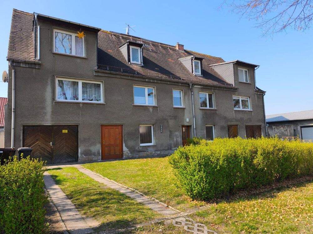 Thumbnail-Voll vermietetes 4-Familienhaus mit 2 Garagen - gepflegter Zustand - Faktor 10