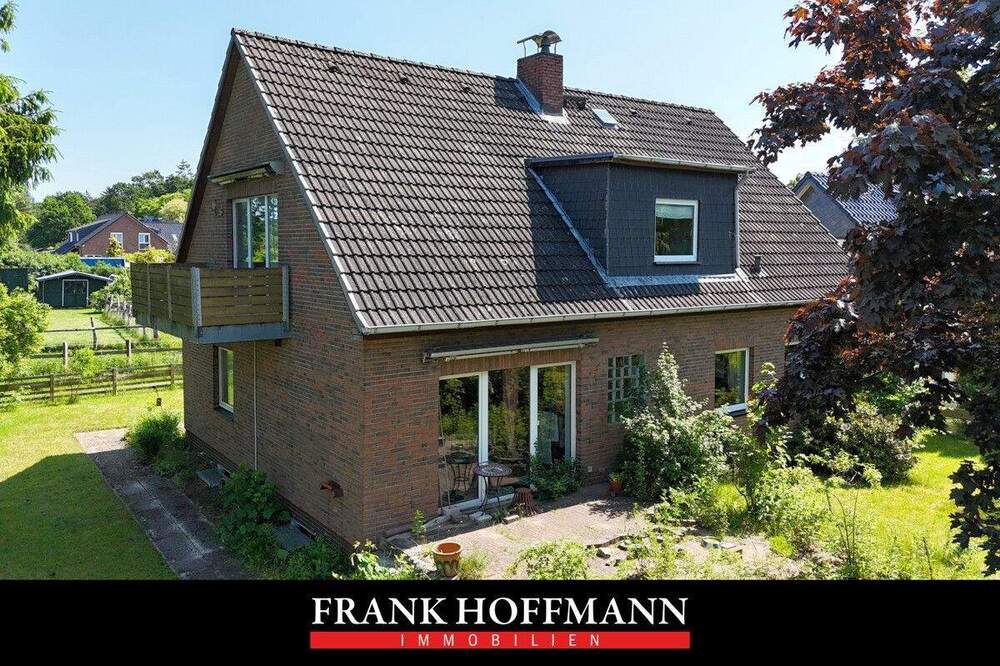 Thumbnail-Teilvermietetes Einfamilienhaus mit Einliegerwohnung in schöner Lage von Hartenholm