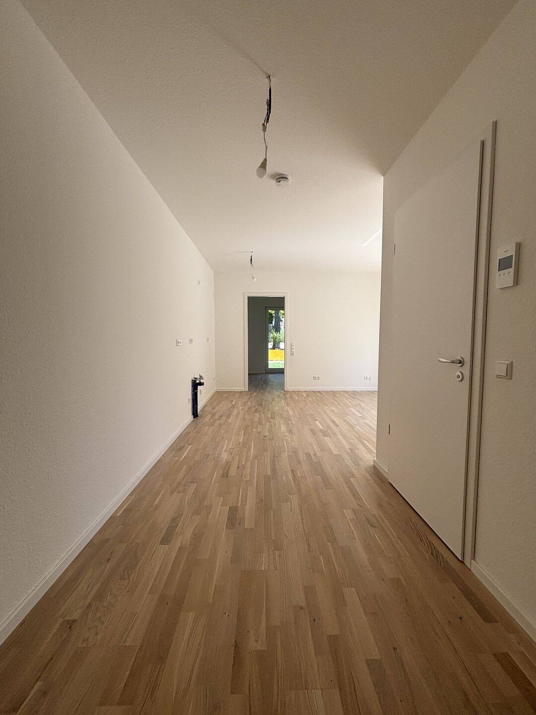 Thumbnail-Moderner Erstbezug: 2-Zimmer-Neubau mit Tiefgaragenstellplatz und Gartenabteil