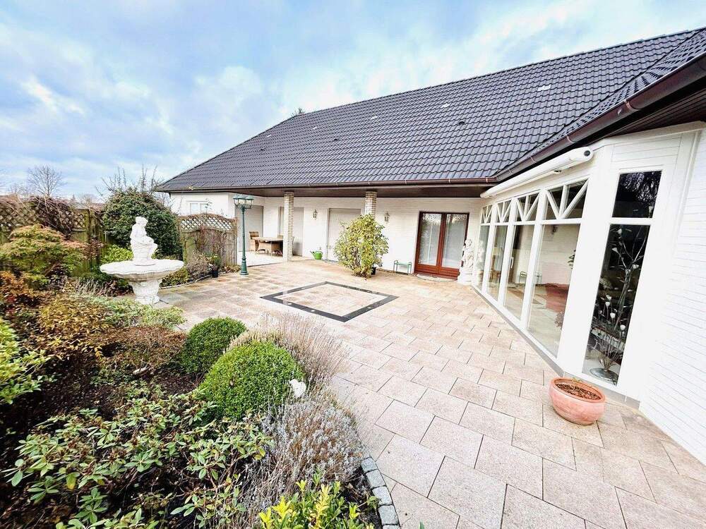Thumbnail-VERKAUFT - Stilvoller Winkelbungalow - auf sonnigem Grundstück