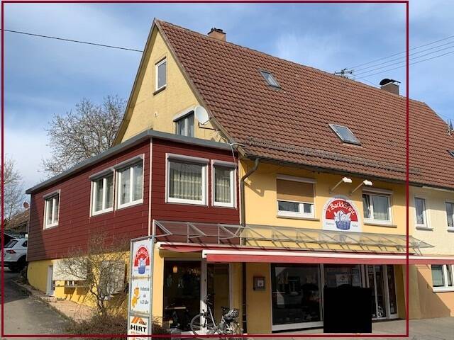 Thumbnail-Doppelhaushälfte mit einer Wohnung und vermietetem Ladengeschäft