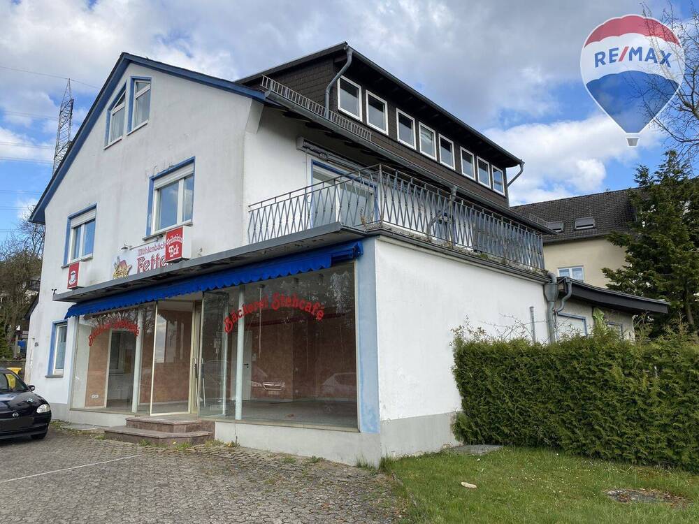 Thumbnail-Mehrfamilienhaus mit Ladengeschäft und Halle