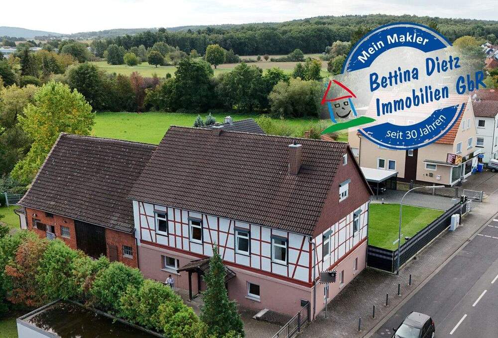 Thumbnail-DIETZ: Geräumiges 1-2 Familienhaus mit großem Grundstück, Nebengebäude und Doppelgarage!