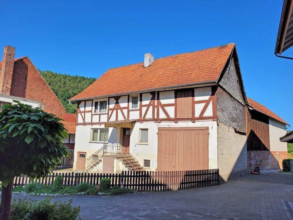 Thumbnail-PREISREDUZIERT!!! Sanierungsbedürftiges Fachwerkhaus mit Werkstatt und Garagen in Neuenstein-Aua