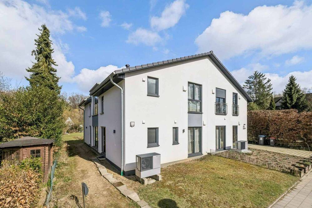 Thumbnail-Architektur trifft Design: Hochwertige DHH in den Walddörfern