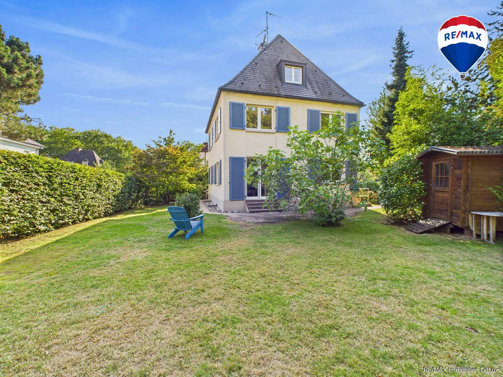 RE/MAX Immobilien DeLux Einfamilienhaus Außenansicht