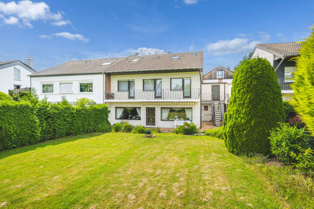 Thumbnail-Attraktives Einfamilienhaus im Bungalowstil mit sonnigem Grundstück und Garage