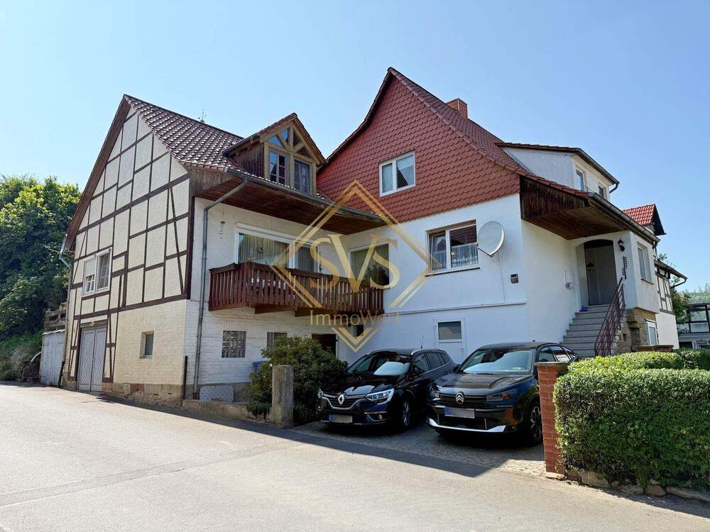 Thumbnail-Ihr neues Zweifamilienhaus mit Garagen, Balkon und Wintergarten in Spangenberg-Pfieffe