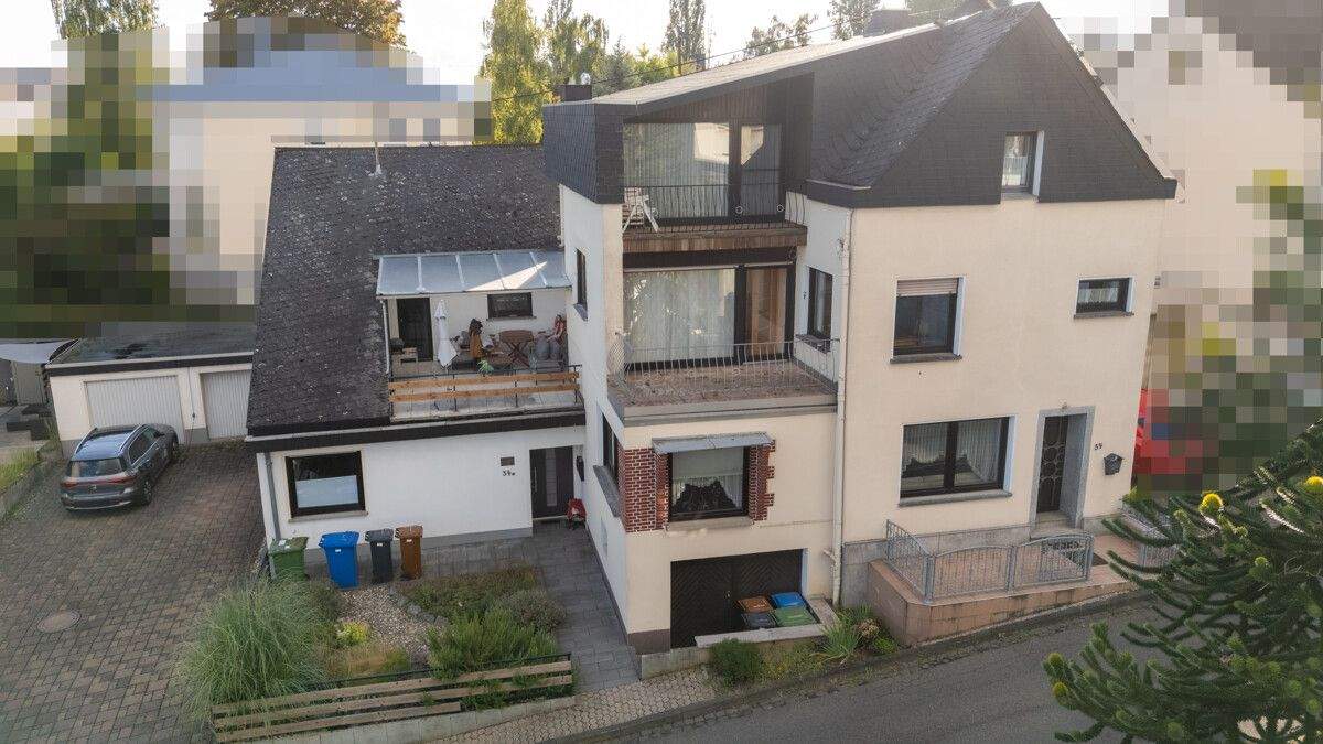 Thumbnail-Zwei Häuser unter einem Dach - großzügiges Wohnhaus mit vermietetem Anbau, Garten, Doppelgarage