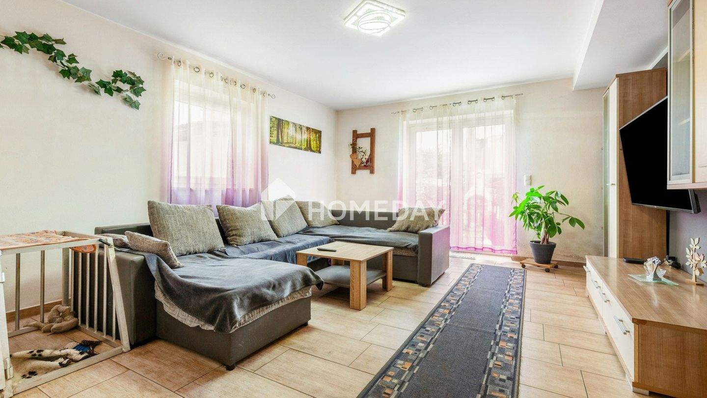 Thumbnail-Charmantes Mehrfamilienhaus mit 3 Einheiten, Garten & Ausbaupotenzial in zentraler Lage