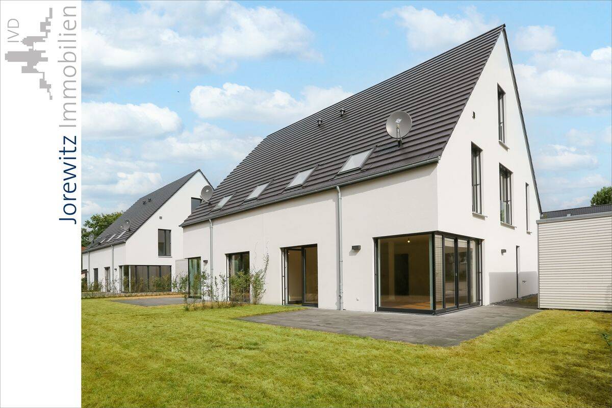 Thumbnail-Bi-Senne: Moderne Neubau-Doppelhaushälfte (KfW-Effizienzhaus 55) mit Carport, Terrasse und Garten