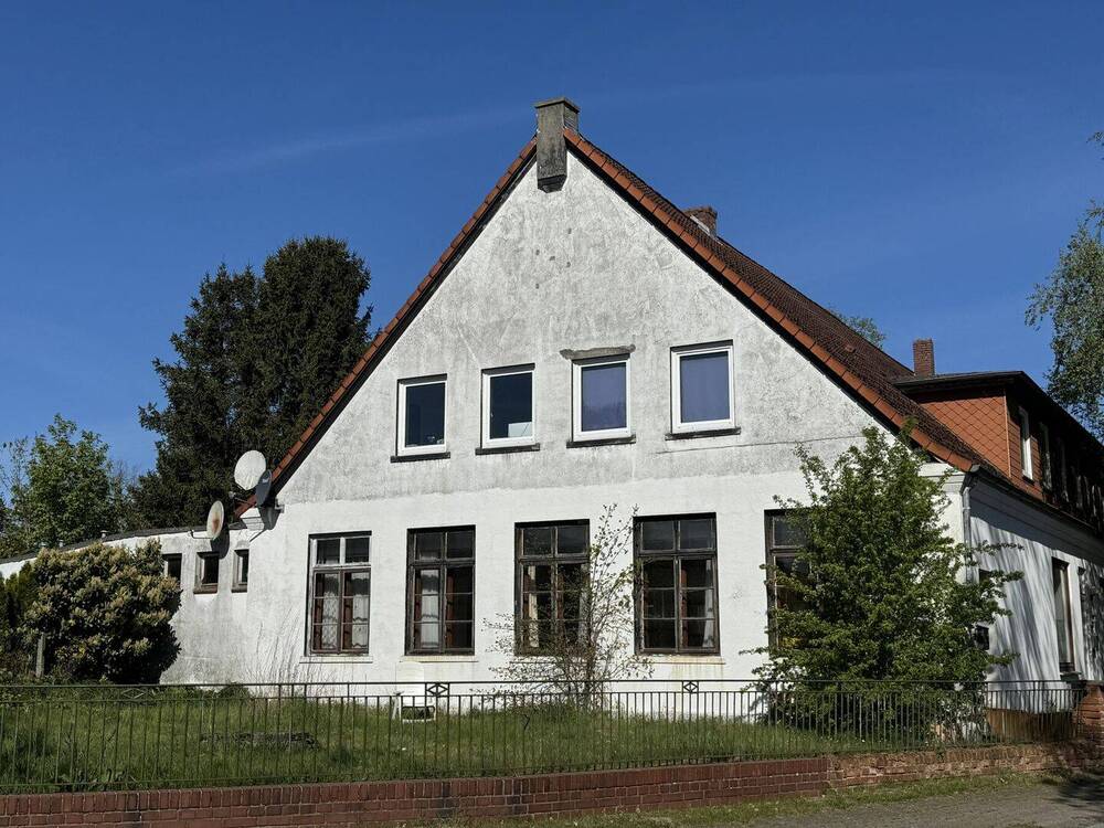 Thumbnail-Syke-Okel: große Erdgeschoss-Wohnung mit Sanierungsbedarf