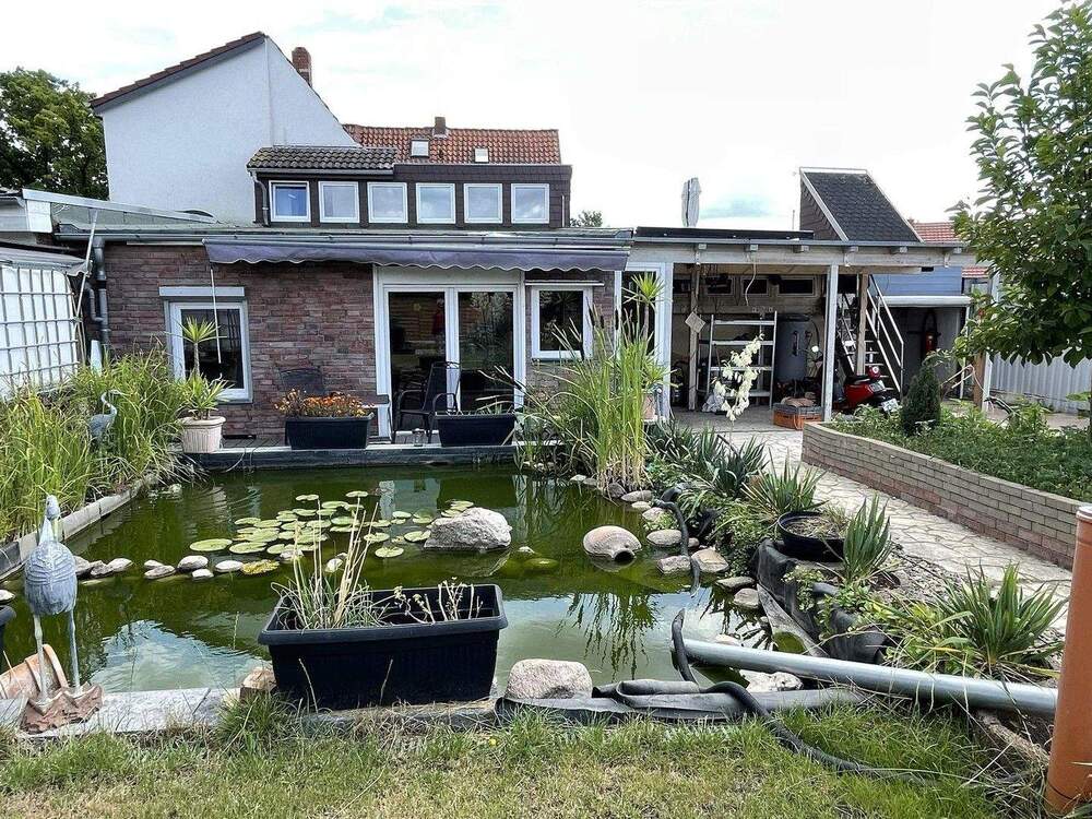 Thumbnail-Arnum: DHH mit gr.Garten, Dachterrasse & 2 Garagen - Ideal f. Familie oder Mehrgenerationenwohnen