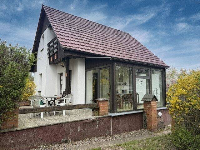 Thumbnail-Ein-Zweifamilienhaus in Blumenholz