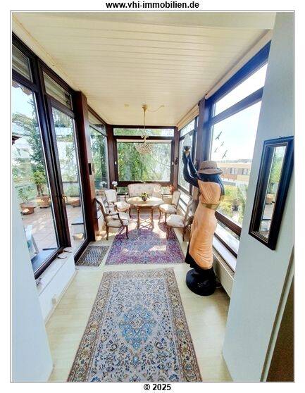 Wintergartenzimmer zum Balkon