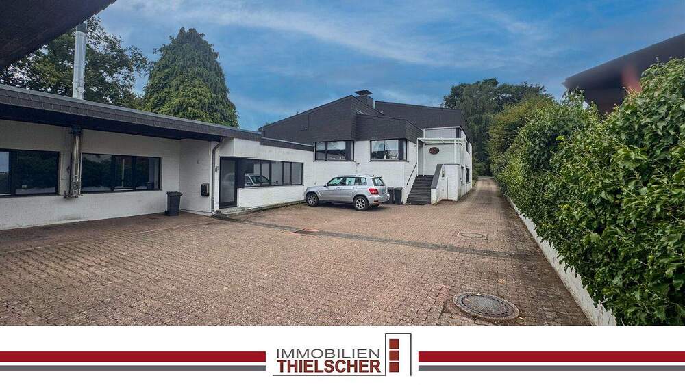 Thumbnail-Adolfosee: Wohnhaus mit Einliegerwohnung, Büro, Lager, 5 Garagen und ausreichend Stellfläche