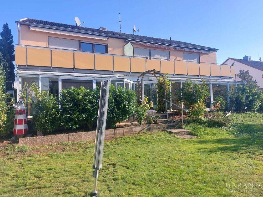 Thumbnail-2 Zimmer-Wohnung für Einsteiger mit Wintergarten und ausgebautem Hobbyraumkeller