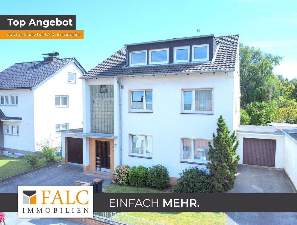 Thumbnail-Dreifamilienhaus mit Traumgarten, Garagen und Chance auf Baugrundstück