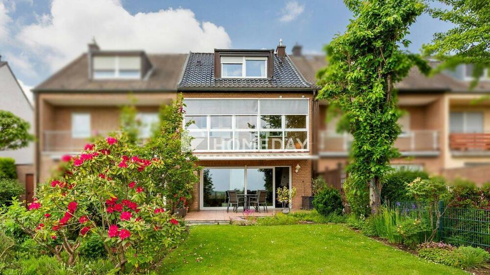 Thumbnail-Großzügiges Reihenmittelhaus mit Einliegerwohnung, Wintergarten und Blick ins Grüne in Köln-Zündorf
