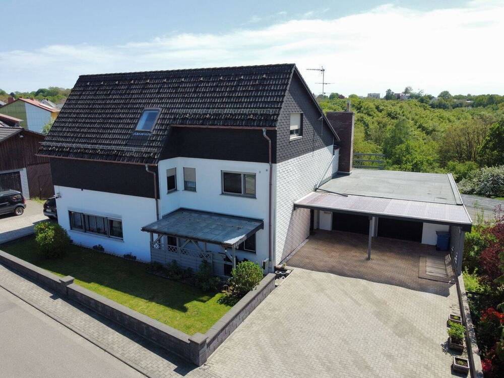 Thumbnail-Großzügiges Einfamilienhaus mit Einliegerwohnung und traumhaftem Weitblick!