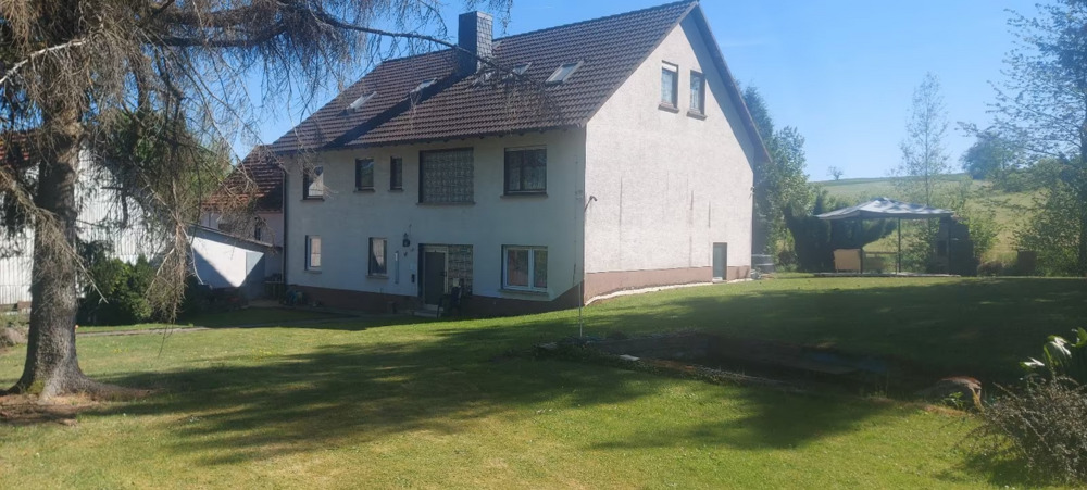 Thumbnail-Großzügiges Mehrfamilienhaus mit Werkstatt, Garten, Teich & Glasfaser in Freiensteinau