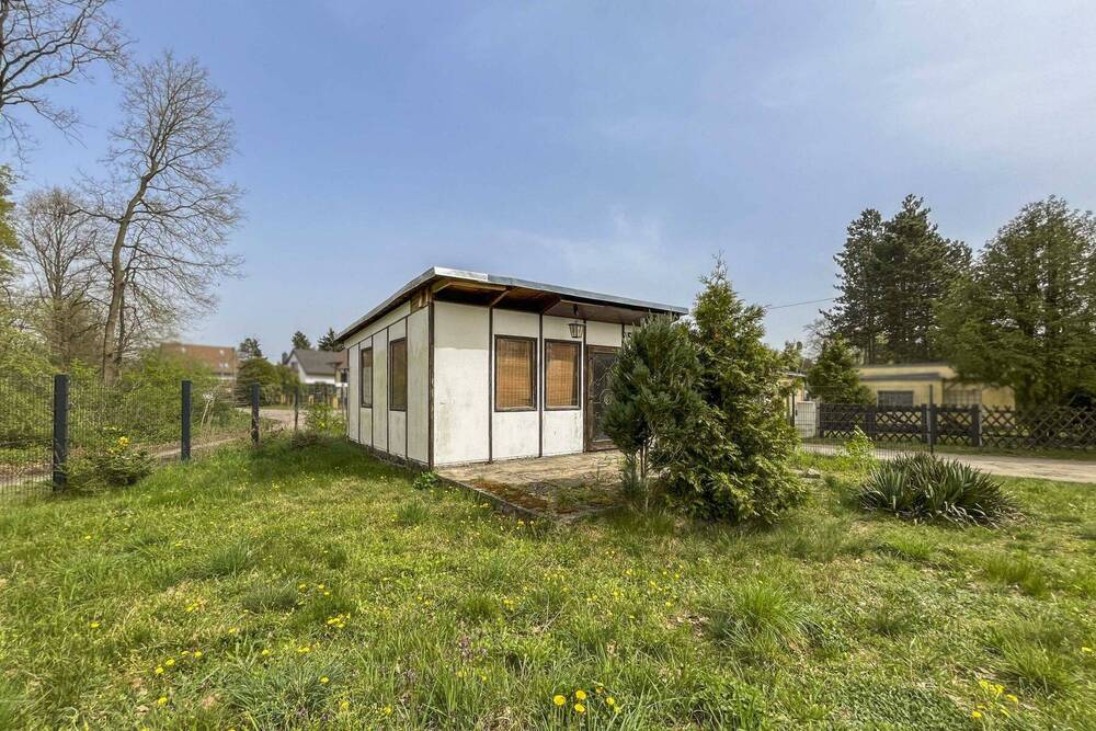 Thumbnail-Kompaktes Grundstück mit gestaltungsbedürftigem Bungalow in beschaulicher Lage