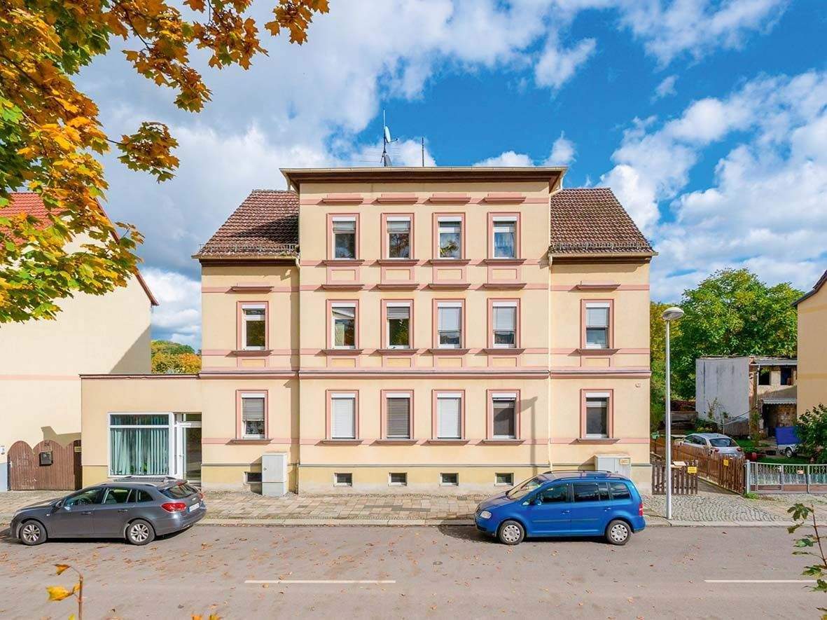 Thumbnail-Überwiegend vermietetes Mehrfamilienhaus mit Nebengebäude