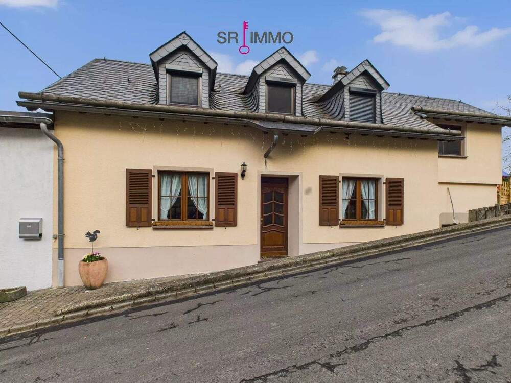 Thumbnail-Gepflegtes Einfamilienhaus mit vielseitig nutzbarem Gewerbeanbau