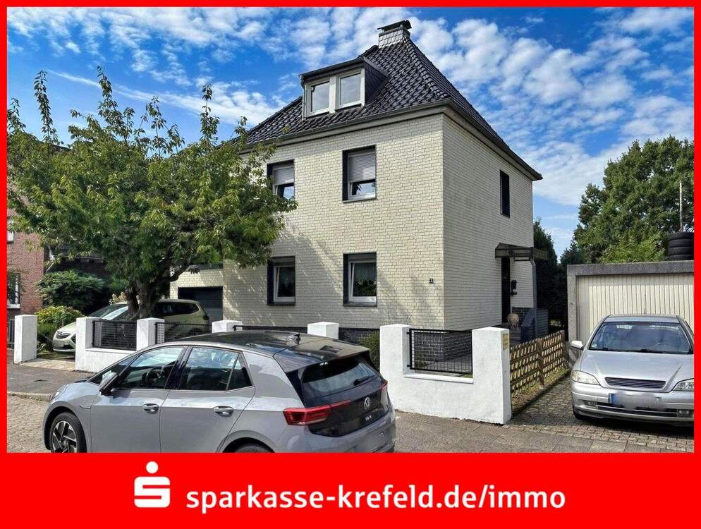 Thumbnail-Freistehendes Zweifamilienhaus mit Garage