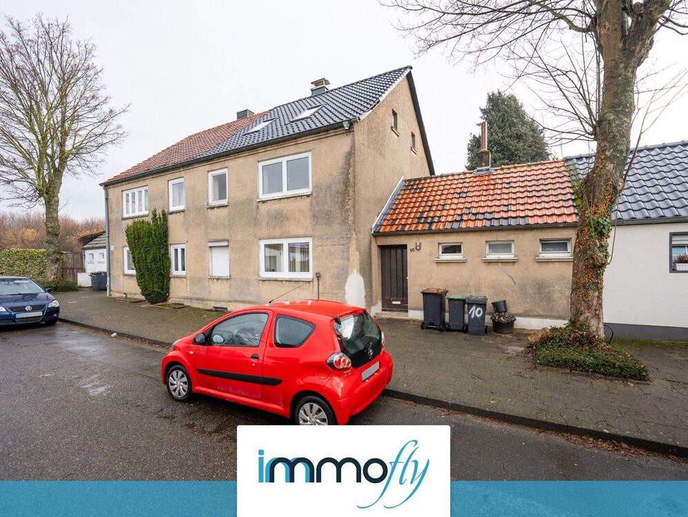 Thumbnail-Charmante Doppelhaushälfte mit Ausbaureserve und vielseitigen Nutzungsmöglichkeiten auf 116m² Wfl.