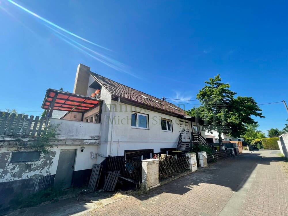 Thumbnail-Mehrfamilienhaus in Hamm am Rhein mit großem Potenzial für ein 4-5 Familienhaus