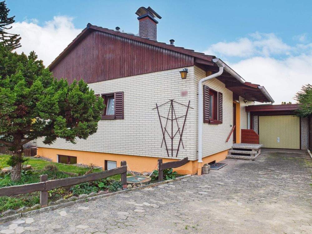 Thumbnail-Charmantes Einfamilienhaus mit Wintergarten, Garage und gepflegtem Grundstück in Minden-Bölhorst