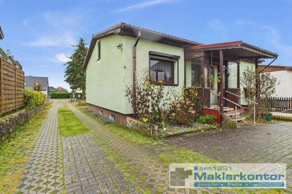 Thumbnail-Gepflegtes Einfamilienhaus mit Souterrain und Einliegerwohnung in begehrter Lage