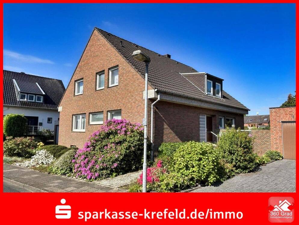 Thumbnail-Freistehendes Zweifamilienhaus mit zwei Garagen