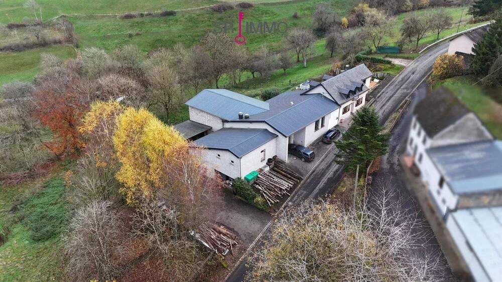 Thumbnail-Gepflegtes Einfamilienhaus mit vielseitig nutzbarem Gewerbeanbau