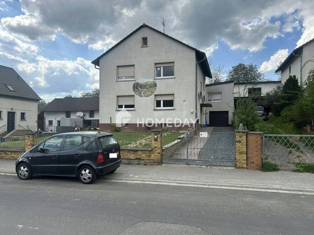Thumbnail-Teilvermietetes Zweifamilienhaus und vermietetes Nebenhaus mit Garage und Garten