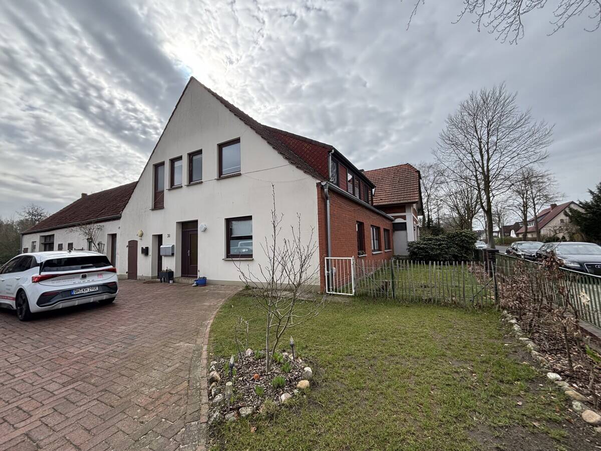 Thumbnail-Erdgeschosswohnung mit Gartenanteil in zentraler Lage von Leeste!