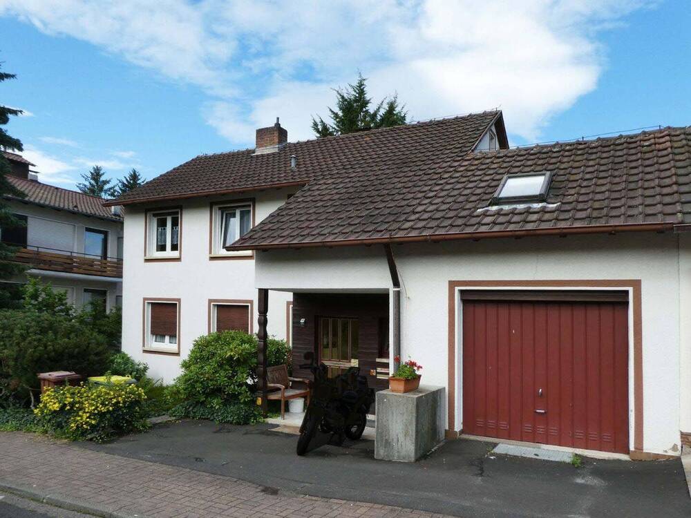 Thumbnail-AUMÜLLER-Immobilien - Freundliches Dreifamilienhaus mit Garage in direkter Nähe zum Kurpark