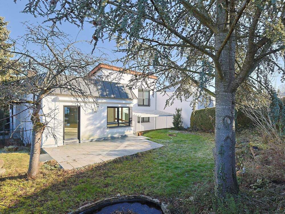 Thumbnail-Attraktives Mehrfamilienhaus mit Kamin, Garten und flexiblem Nutzungskonzept