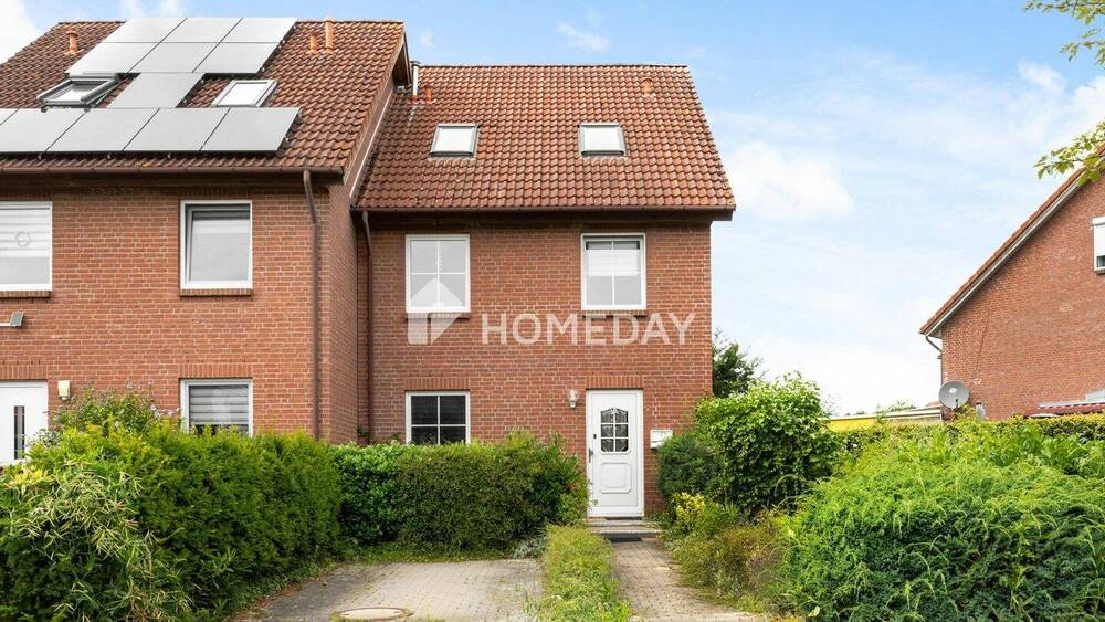 Thumbnail-Reihenendhaus mit Gartenidylle und freundlichem Erscheinungsbild