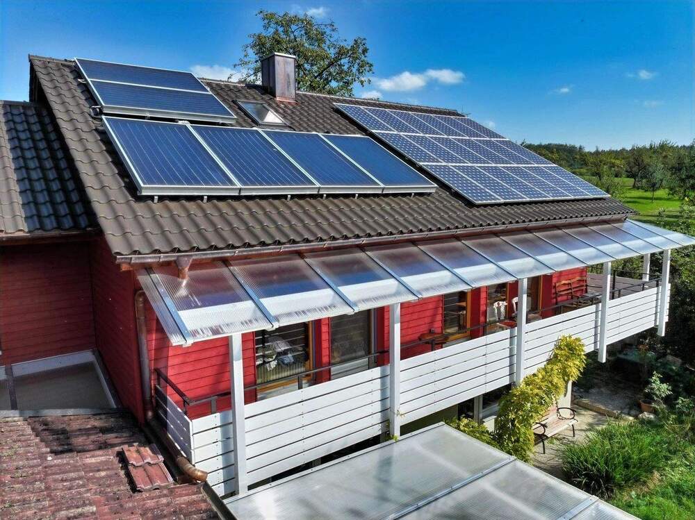 Thumbnail-HAUS MIT HERZ IM GRÜNEN