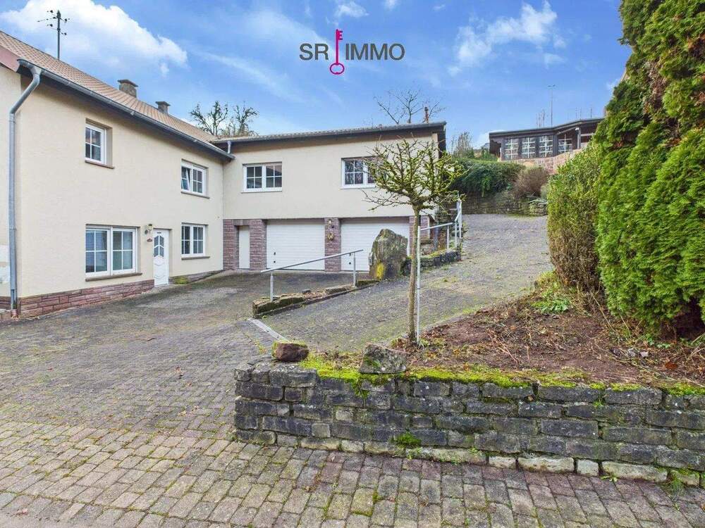 Thumbnail-Wohnen mit Perspektive: Haus mit zwei Wohnungen und Baugrundstück in Baustert