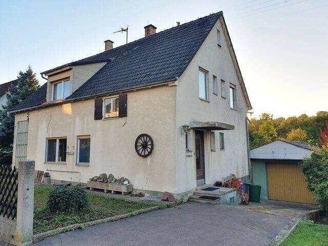 Thumbnail-Freistehendes Einfamilienhaus mit Garten und Garage - ideal für Familien!