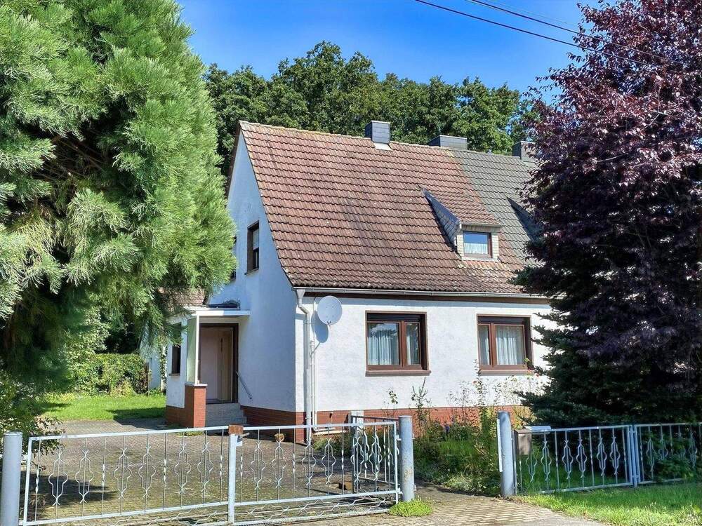 Thumbnail-Doppelhaushälfte mit Charme und Entwicklungsmöglichkeiten