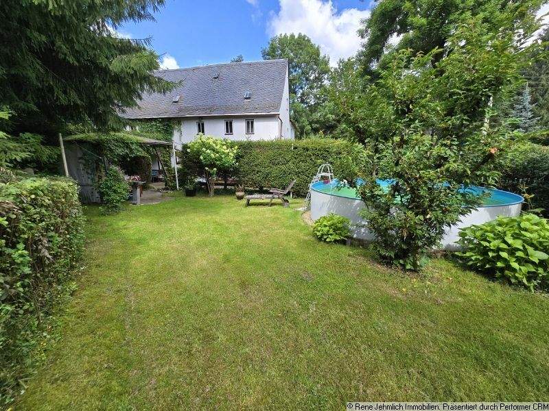 Thumbnail-Sanierungsbedürftiges EFH mit 212qm auf 1.770qm Grundstück mit Pool & Doppelgarage + Gartenhaus