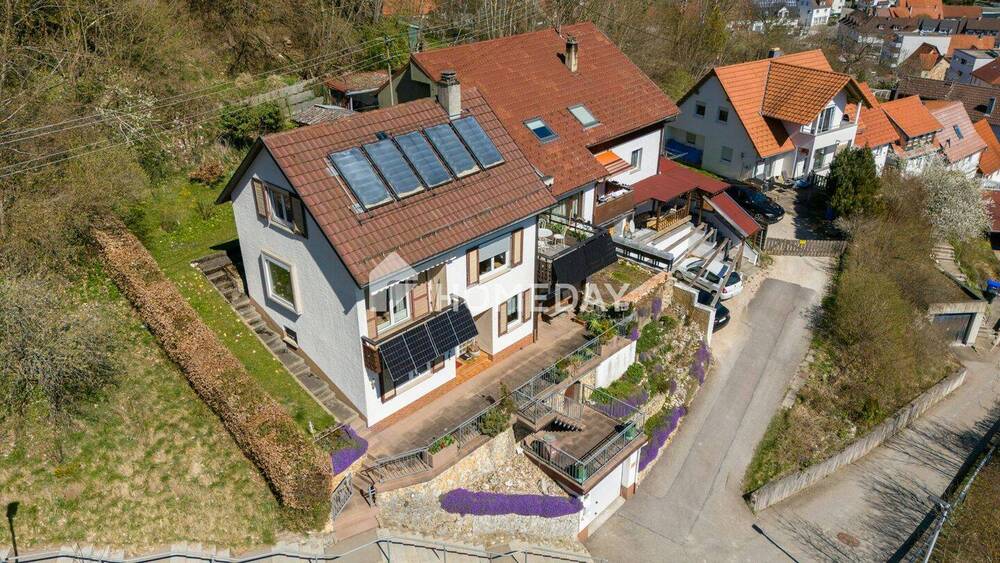 Thumbnail-Gemütliches Einfamilienhaus in schöner Halbhöhenlage samt tollem Ausblick, Garten und Garage