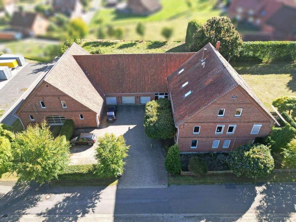 Thumbnail-Attraktives Mehrfamilienhaus mit Gewerbeflächen und nachhaltigem Energiekonzept