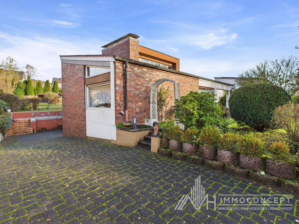 Thumbnail-Zeitlose Architektur mit Haltung - Bungalow in Bestlage von Wittlich mit MFH-Potenzial